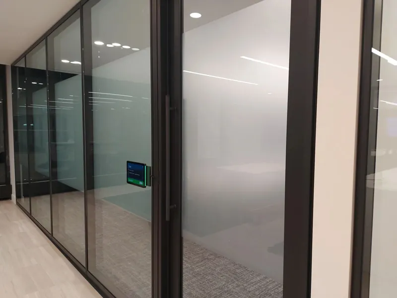 Office glass walls with frosted privacy film