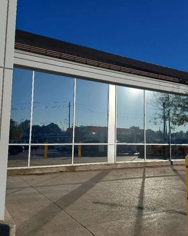 Storefront windows with sun and solar control film